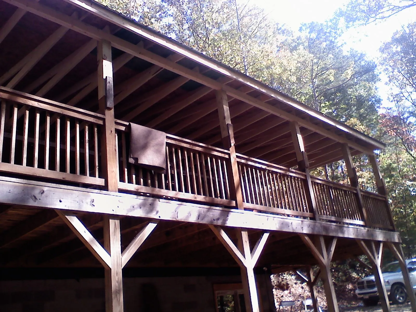 Timber framing under a new elevated porch and deck — Roof Leak Repair in Alta by Roofing Brothers